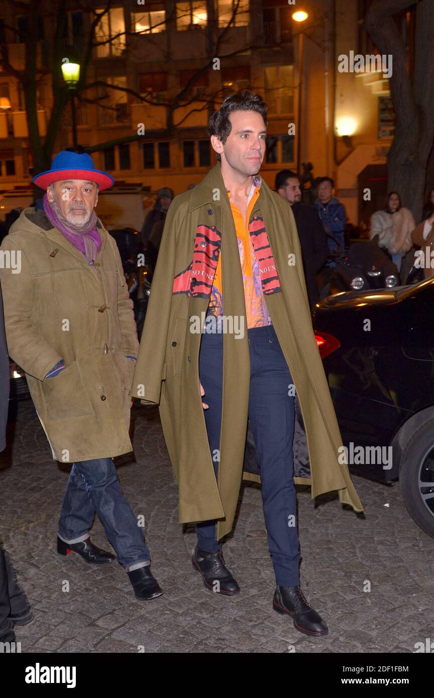 Christian Louboutin and Mika arriving at the Valentino show as a