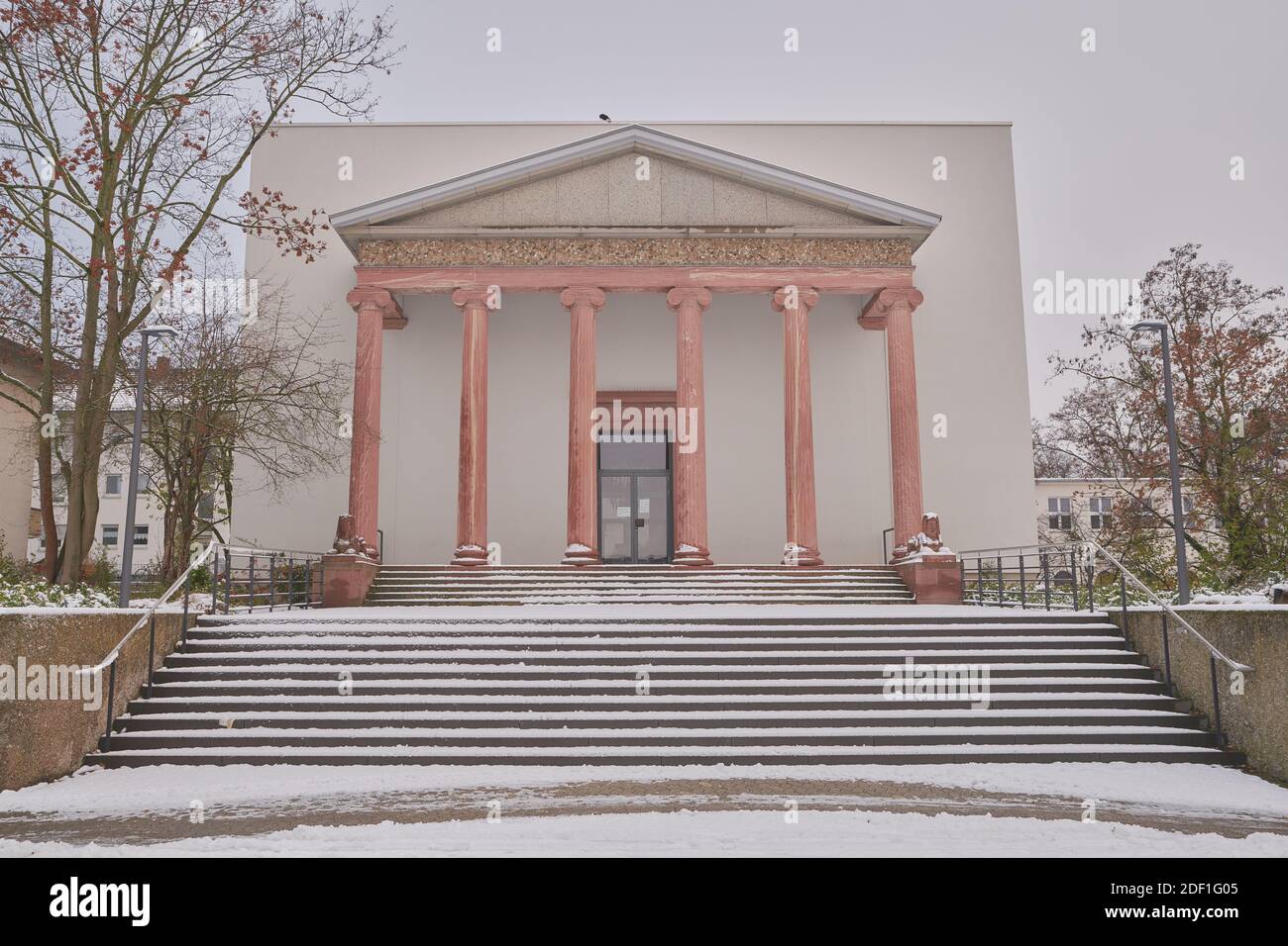 Darmstadt, Hessen, Germany - 01 Dec 2020: Theater Moller Haus, main facade and entrance covered by snow. Stock Photo