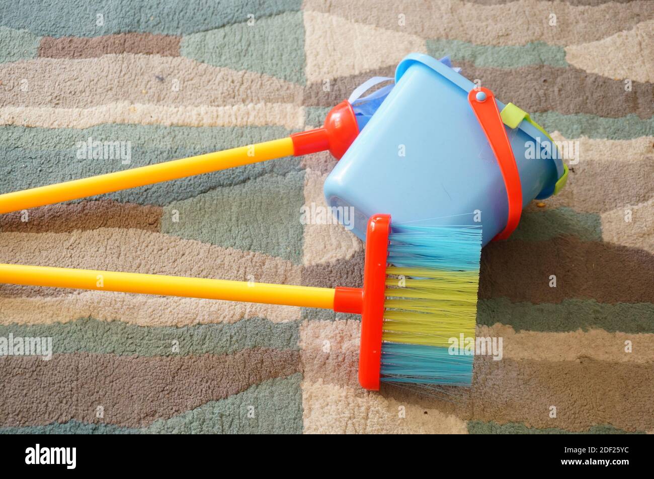 A closeup shot of cleaning tools on a rug Stock Photo
