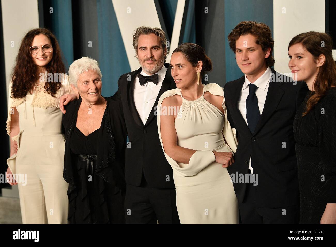 Joaquin Phoenix with sister Rain Phoenix (1st L) and mother Arlyn