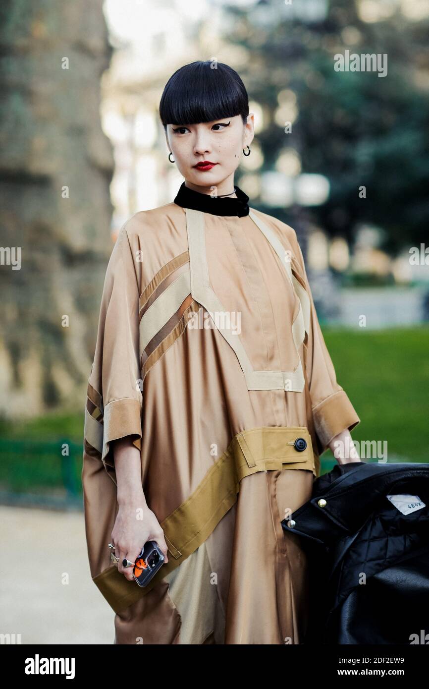 Street style, Kozue Akimoto arriving at Sacai Fall Winter 2020-2021