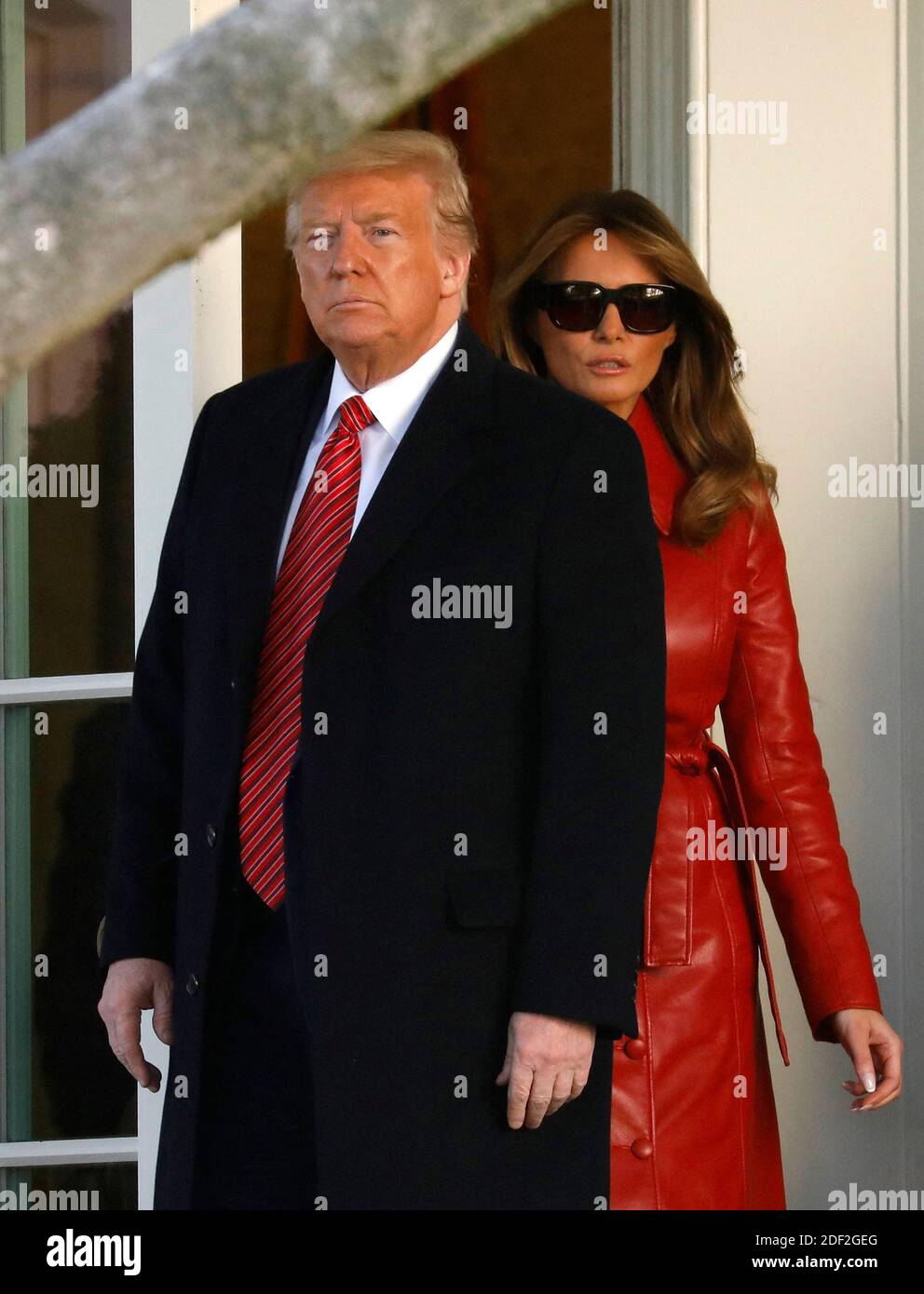 U.S. President Donald Trump with First Lady Melania Trump walks out ...