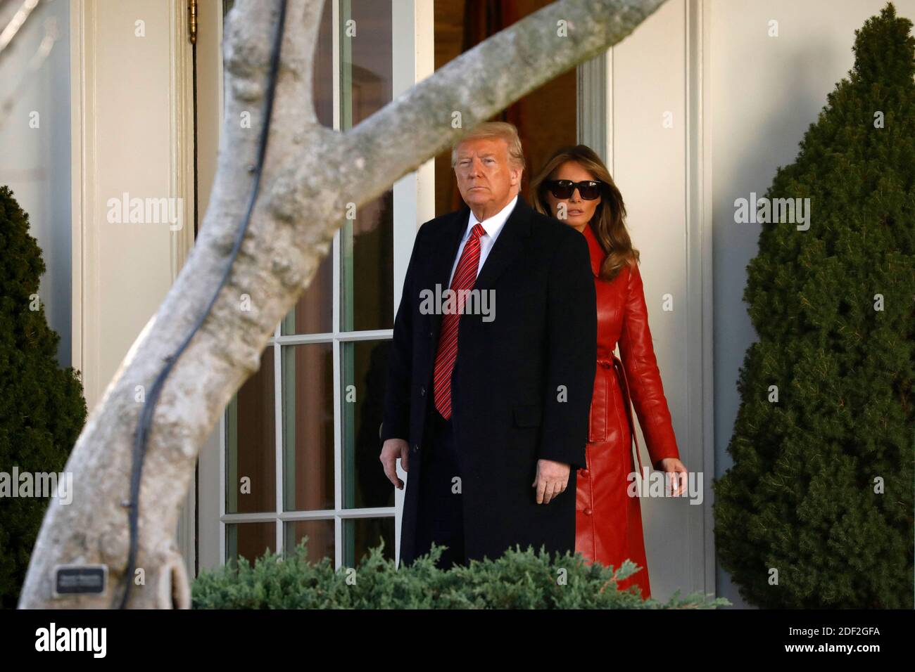 U.S. President Donald Trump with First Lady Melania Trump walks out ...