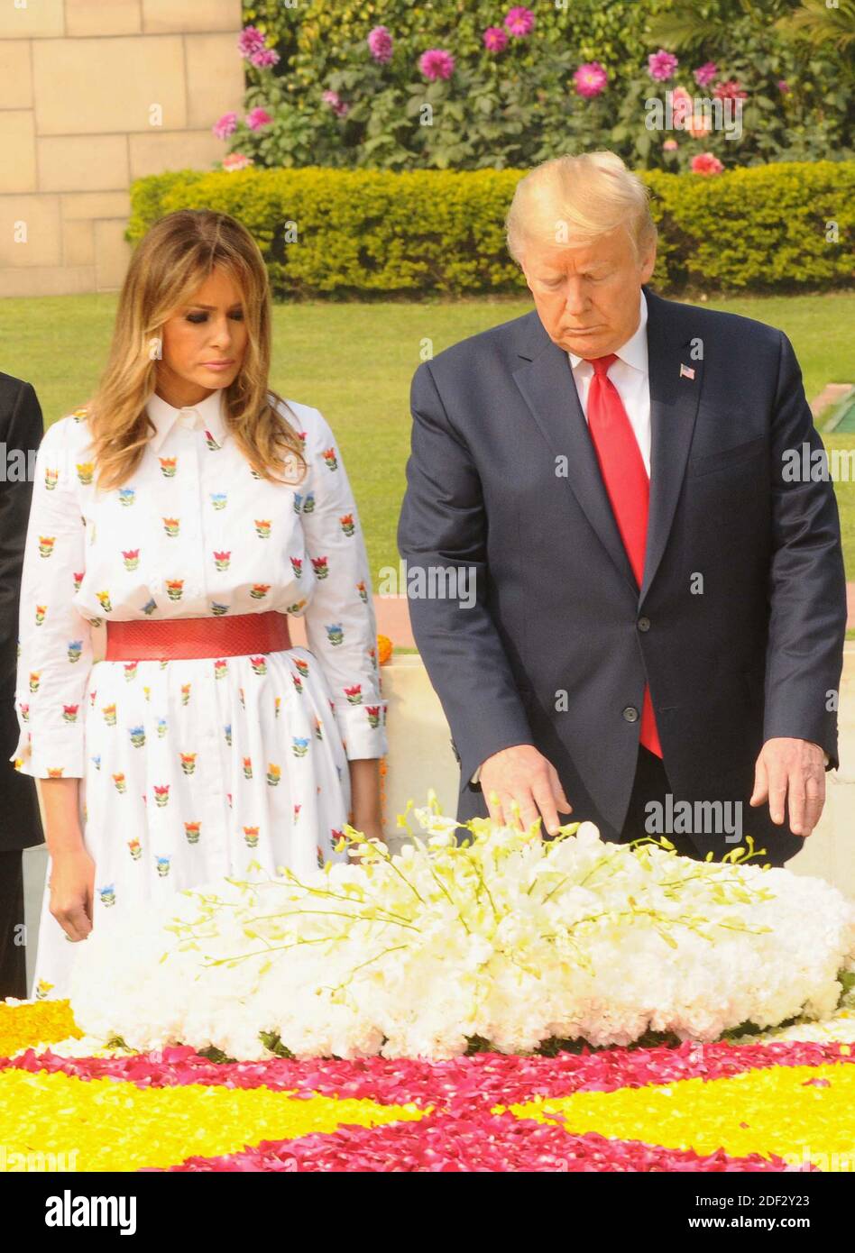 US President Donald Trump and First Lady Melania Trump pay tribute at  Rajghat, the memorial for