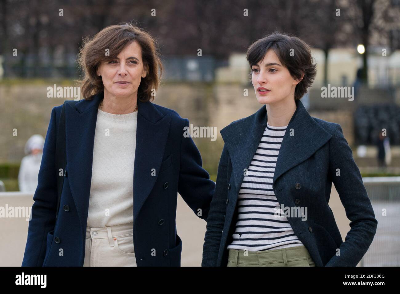 Ines de la Fressange with Nine, her daughter, leaving Christian Dior show  as part of the Paris Fashion Week Womenswear Fall/Winter 2020/2021, during  Paris fashion Week on February 25, 2020 in Paris,