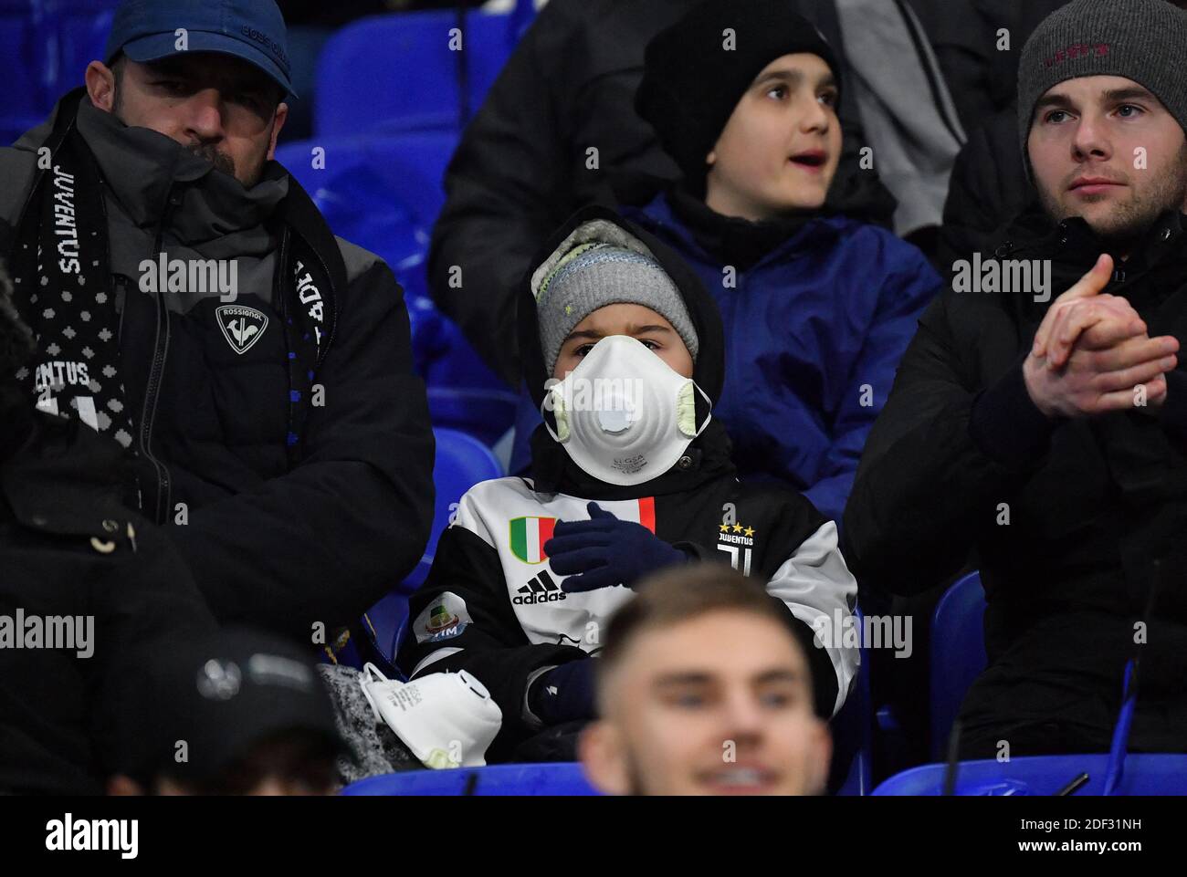 Football fans wear masks amid coronavirus fear during UEFA Champions ...