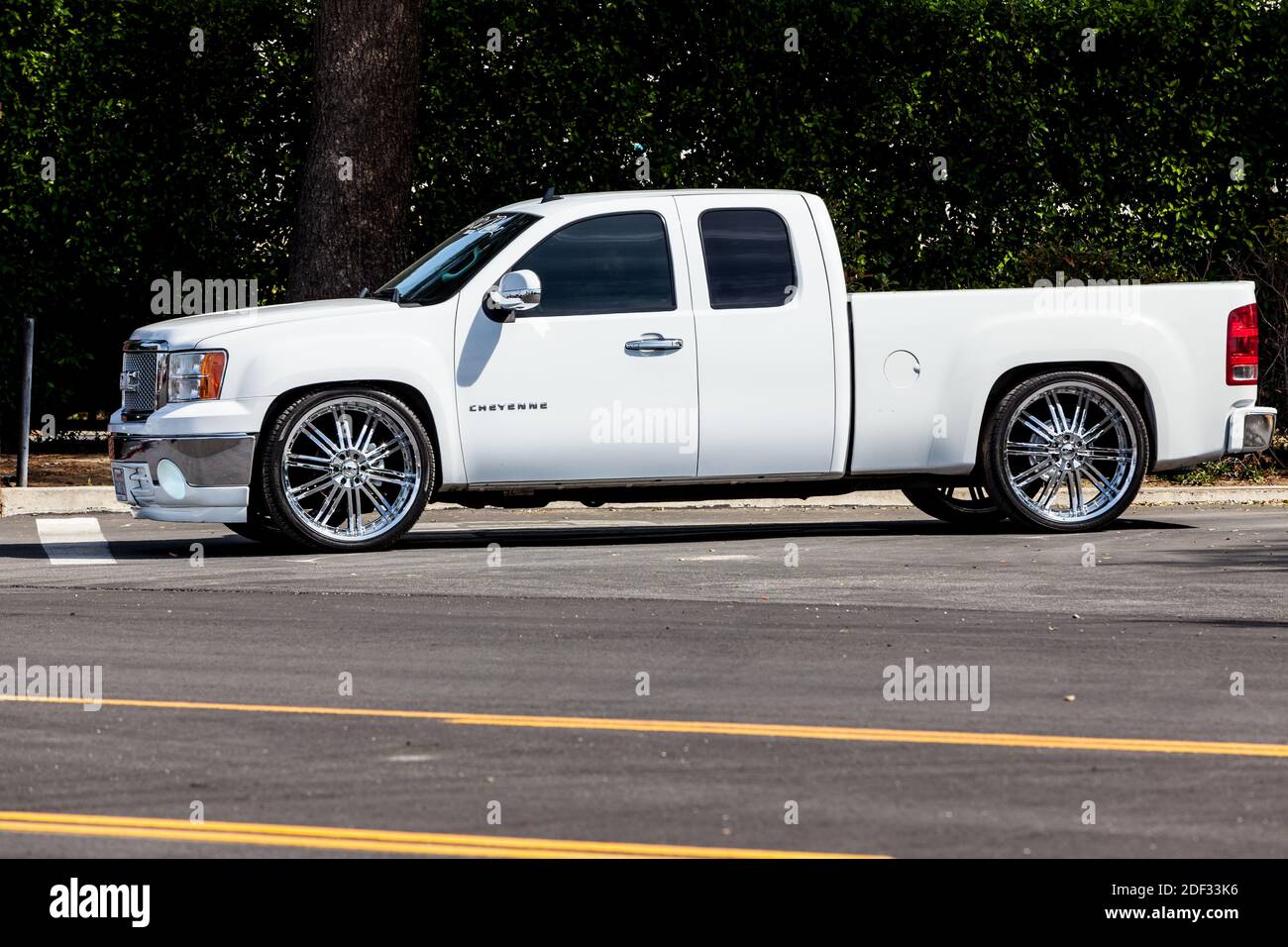 A lowered custom Chevy truck with big wheels Stock Photo