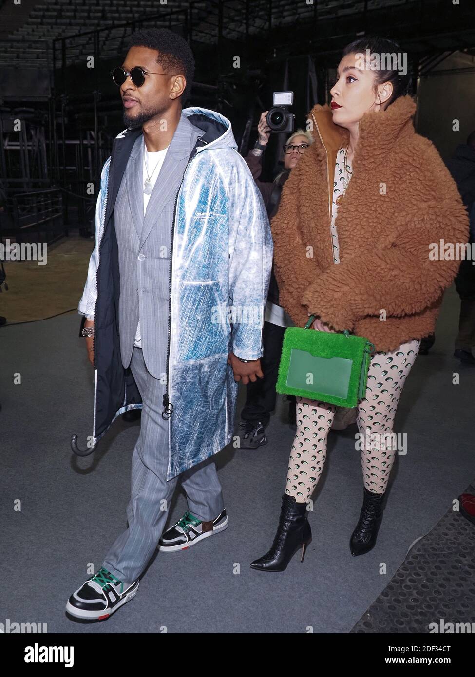 Usher and his girlfriend Jennifer Goicoechea attending the Off White