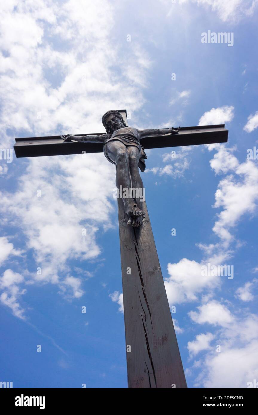 The statue of the cross and the crucifixion of Jesus with the blue sky ...