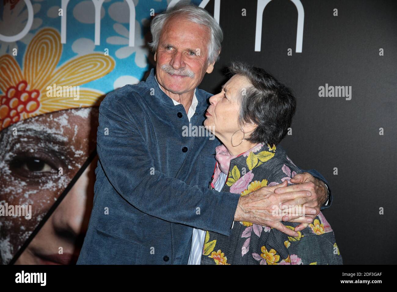 Yann Arthus-Bertrand and wife Anne attending Woman premiere held at UGC Normandie in Paris, France on March 3, 2020. Photo by David Boyer/ABACAPRESS.COM Stock Photo