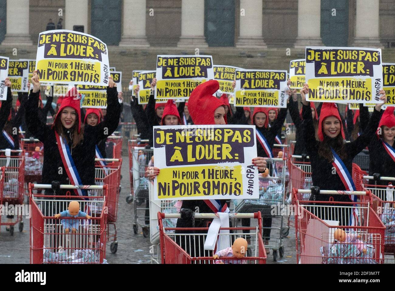 A hundred women dressed as Marianne (symbol of French Republic) stage a  protest against assisted reproductive technology (ART) and surrogacy in  front of the National Assembly (French Parliament), a Flash mob organised