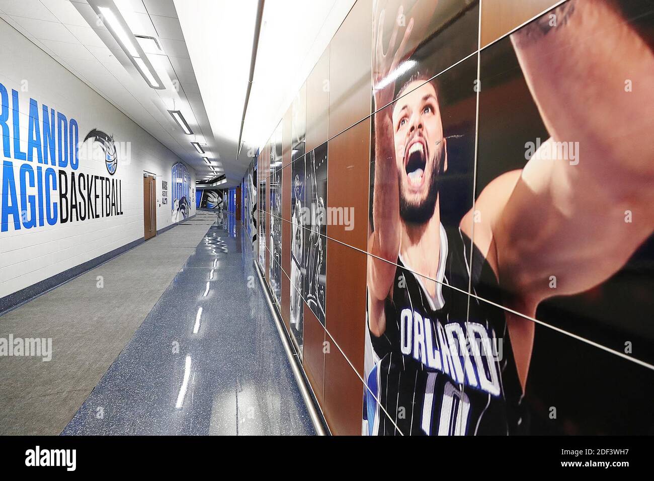 The hallway outside the locker room is empty at the Amway Center in  Orlando, home of the NBA's Orlando Magic, on Thursday, March 12, 2020. The  NBA has suspended the season due