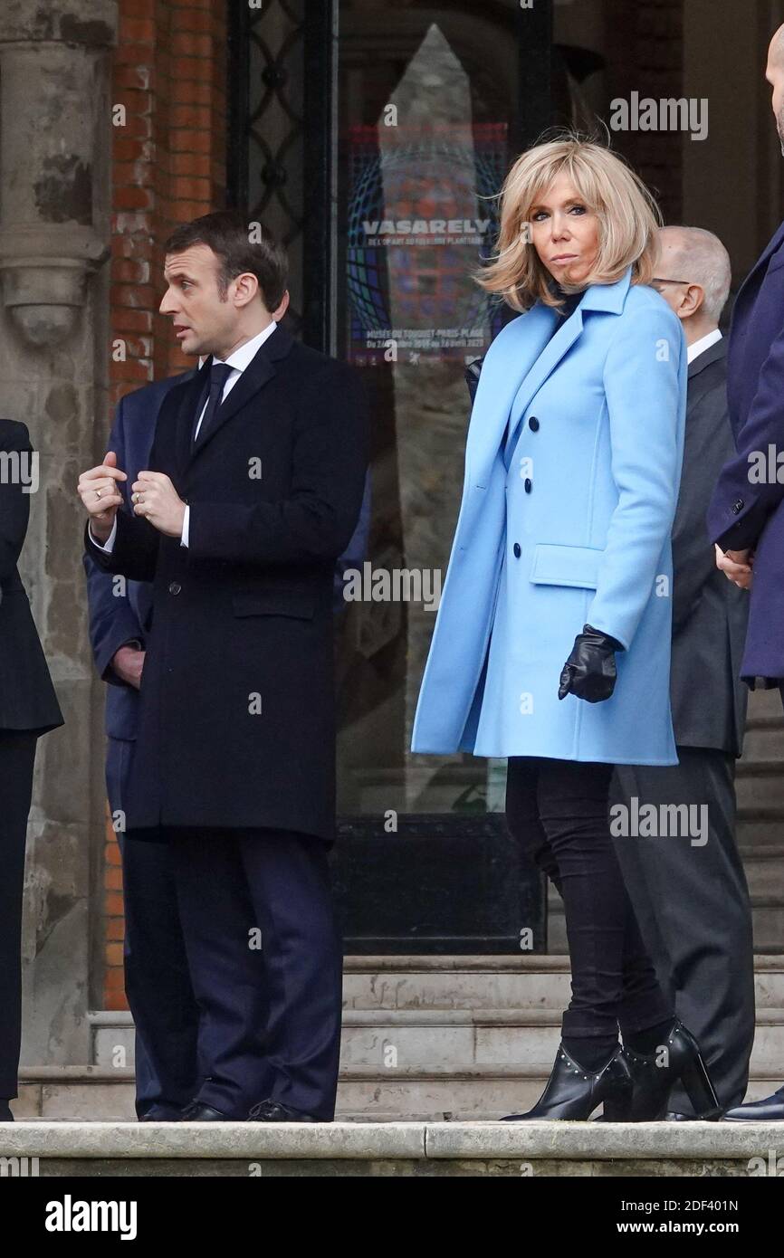 French President Emmanuel Macron and his wife Brigitte Macron leave their homes to go out and vote during the first round of municipal elections in Le Touquet, France on March 15, 2020. Photo by Francis Petit/ABACAPRESS.COM Stock Photo