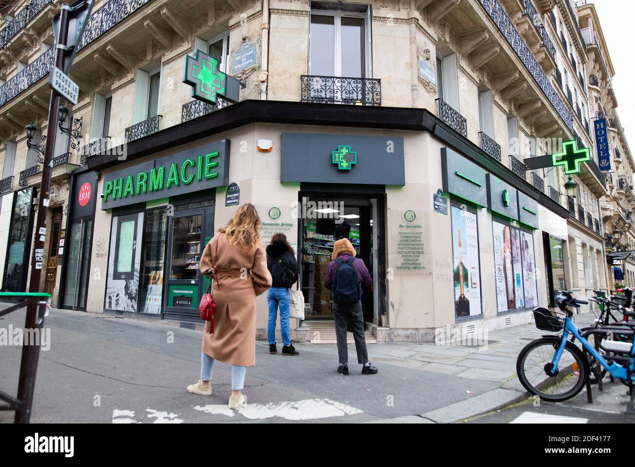 People Queue In Front Of A Pharmacie Pharmacy Drugstore On March 16 In Paris While Protective Measures Are Taken In France Against The Spread Of The Covid 19 French