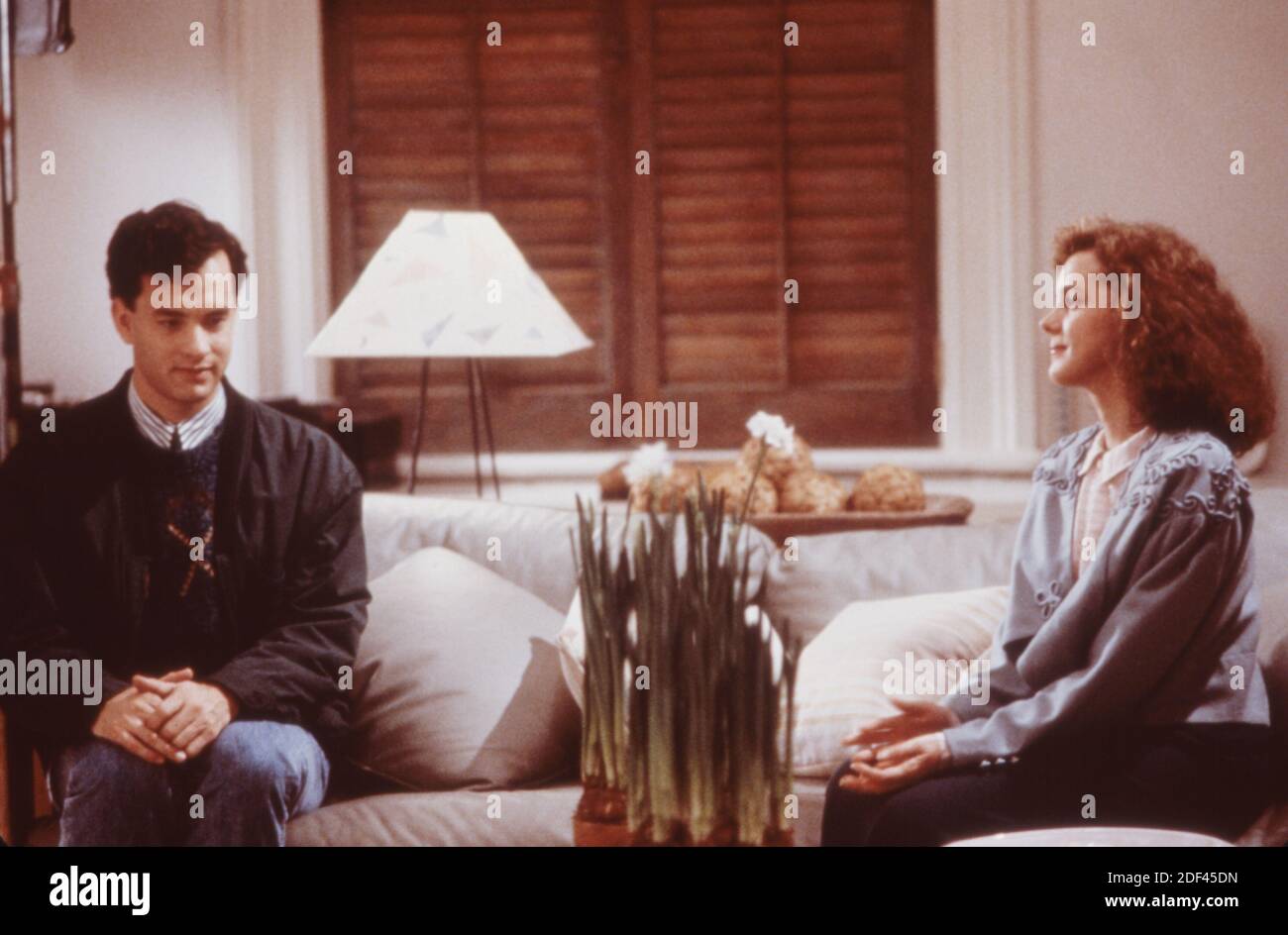 Tom Hanks as Josh Baskin and Elizabeth Perkins as Susan Lawrence in Big Stock Photo