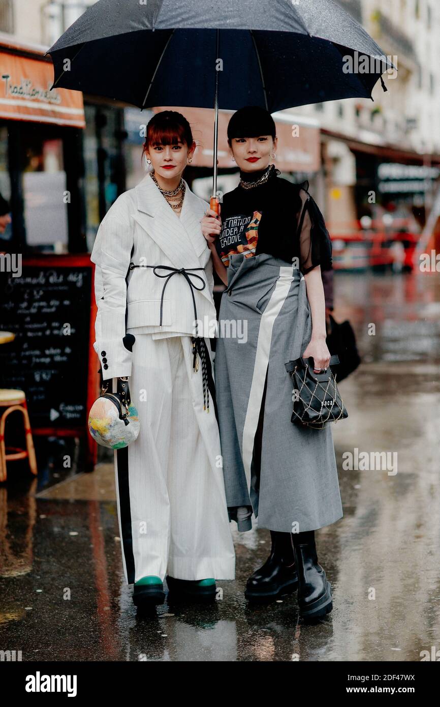 Street style, Mademoiselle Emma and Kozue Akimoto arriving at Sacai