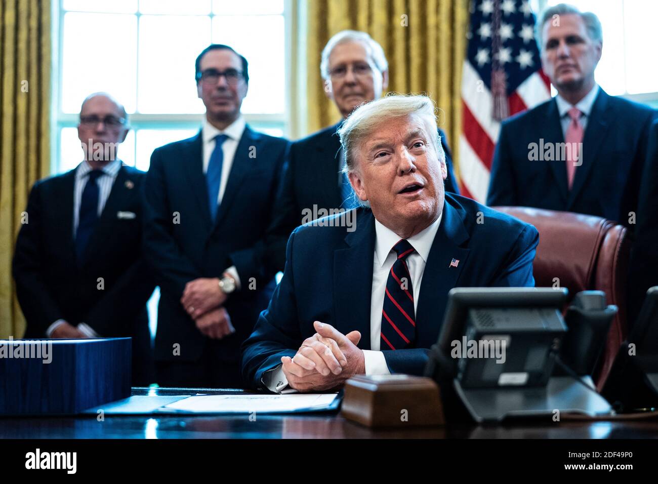 President Donald Trump participates in a signing ceremony for a two ...