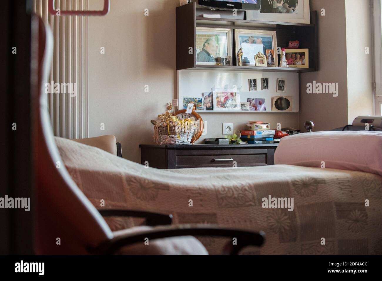 Pictures stand on furnitures in a resident's room on March 27, 2020 in