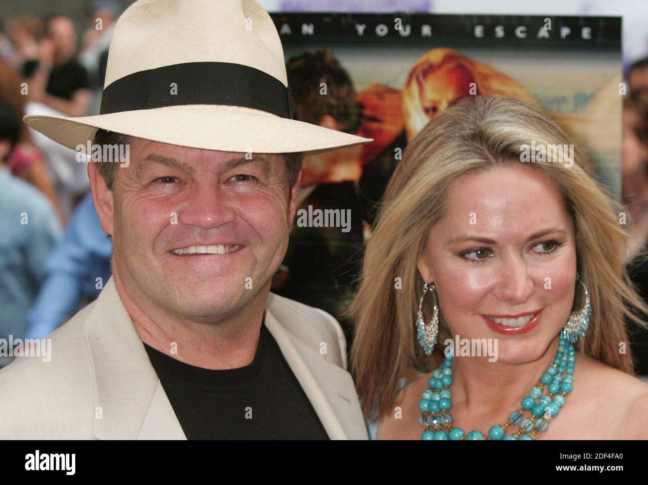 Micky Dolenz with his wife Donna Quinter attend the premiere of "The Island" at the Ziegfeld