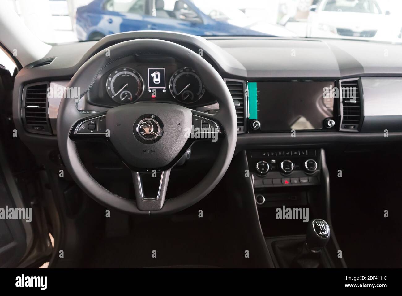 The place of driving a car inside the cabin with a steering wheel and a