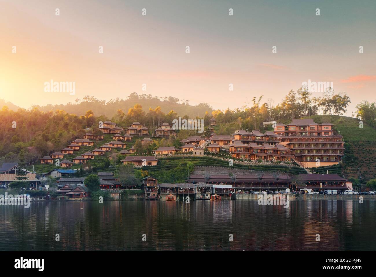 Ban Rak Thai Village is a Chinese settlement with lake during sunset in Mae Hong Son province near Chiangmai, Thailand. Stock Photo