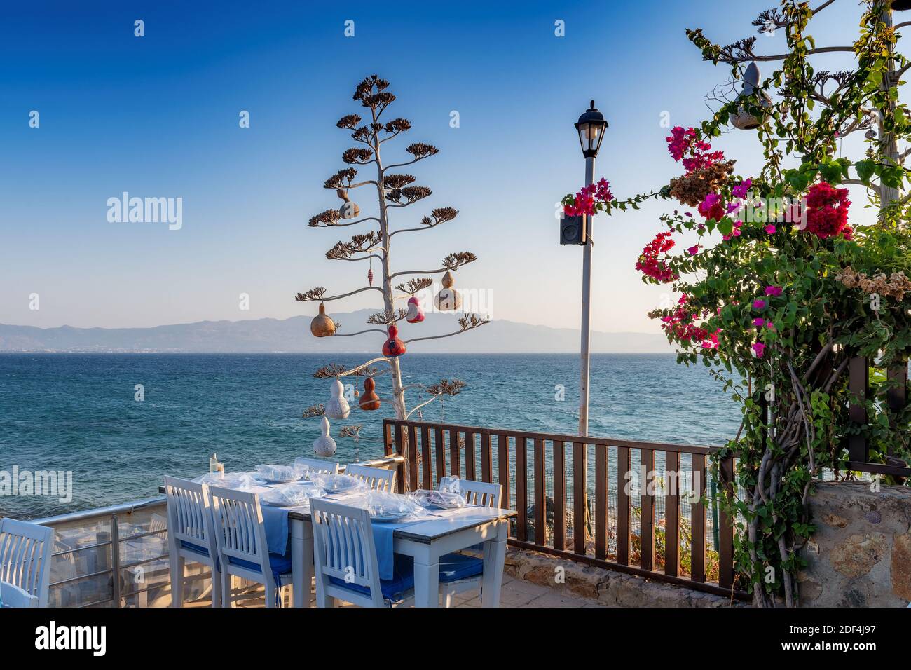 Sea view beach restaurant at sunset in Bodrum, Turkey. Stock Photo