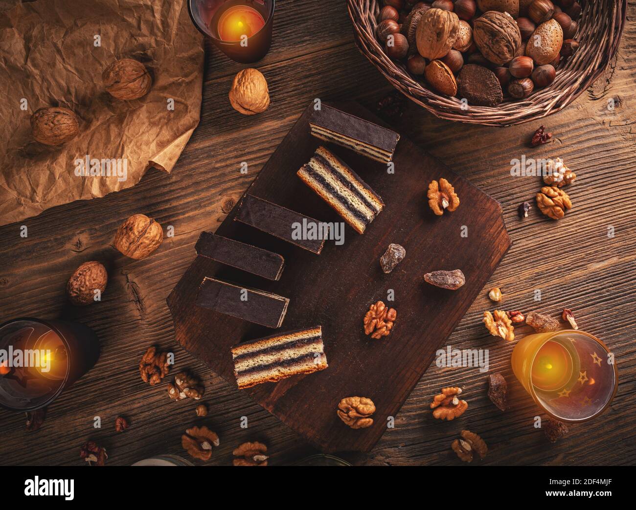 Hungarian Gerbeaud layered cake with walnut and apricot jam filling