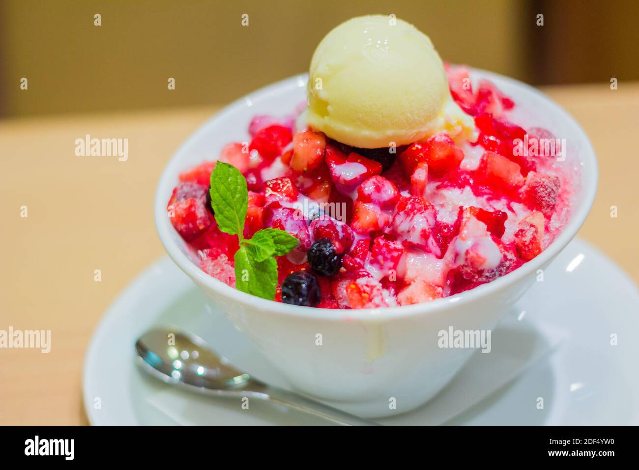 Kakigori, Japanese shaved ice dessert topped with ice cream at a dessert bar in Kyoto, Japan Stock Photo