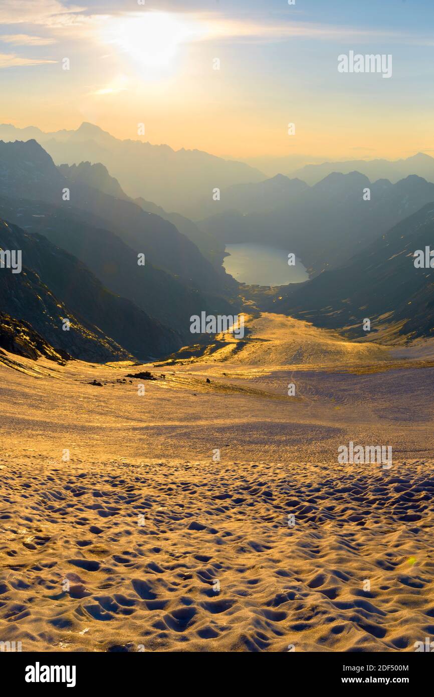 geography / travel, Switzerland, Canton of Bern, Goden sunrise over the Oberaar glacier, with lake Obe, Additional-Rights-Clearance-Info-Not-Available Stock Photo