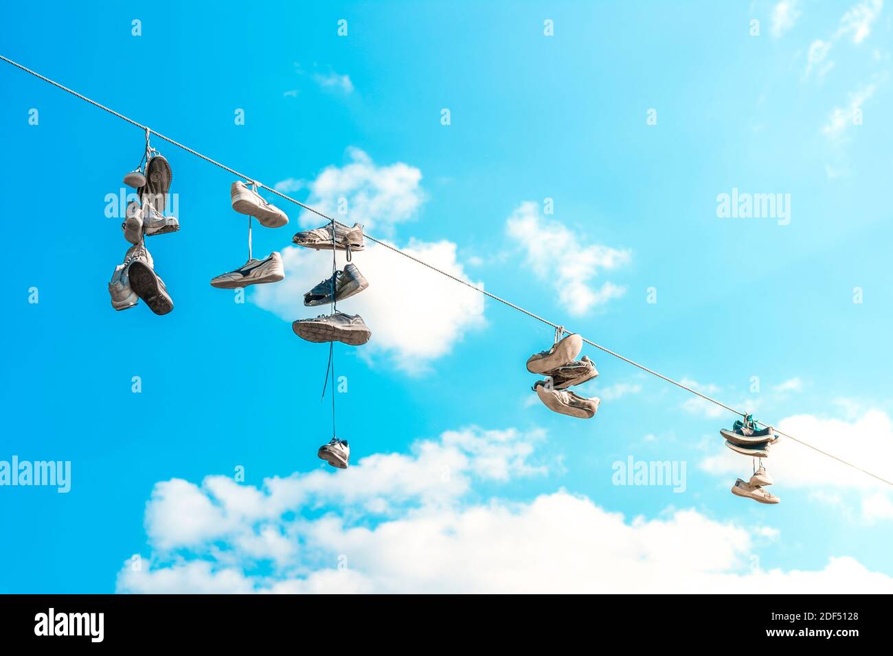 Sneakers on power lines hi-res stock photography and images - Alamy