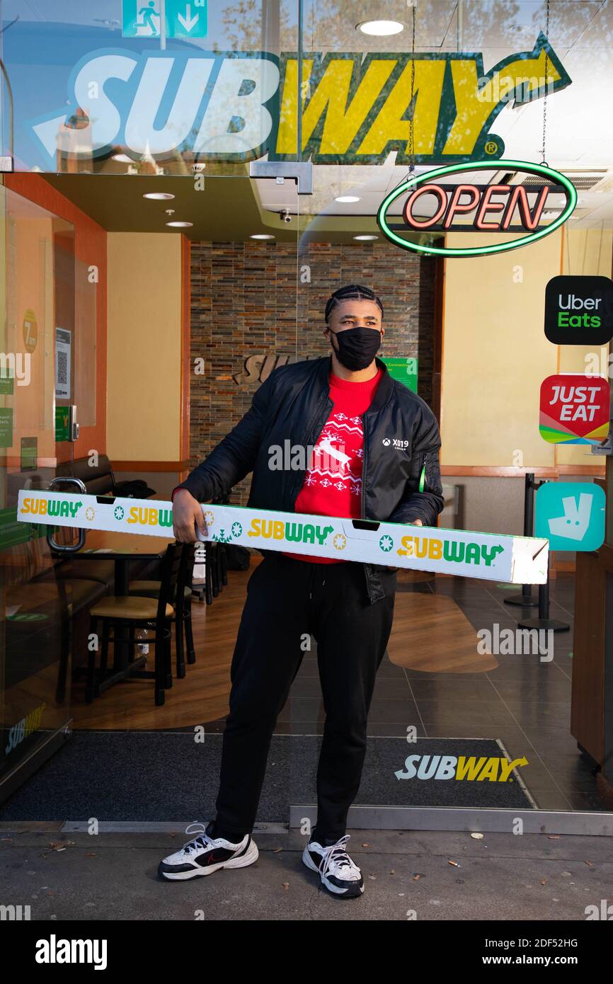 EDITORIAL USE ONLY A 6ft Pig in Blanket Sub sandwich is launched by