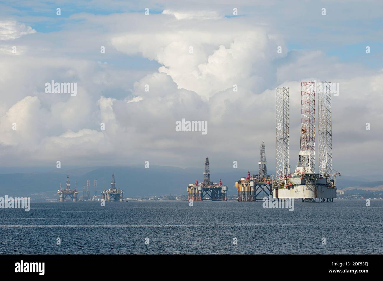 Oil drilling platforms moored in Cromarty Firth, Scotland Stock Photo