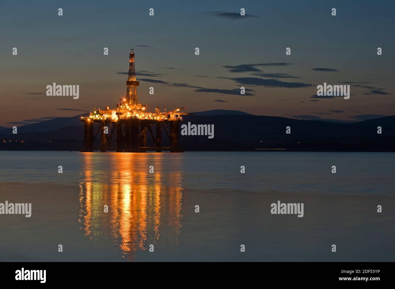 Oil drilling platforms moored in Cromarty Firth, Scotland Stock Photo