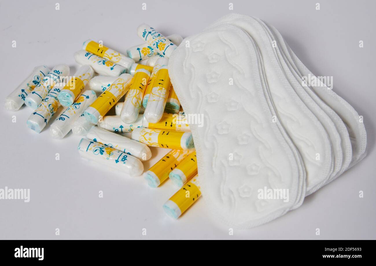 Berlin, Germany. 27th Nov, 2020. Tampons of the brand o.b., as well as  Rossmann's own brand "facelle" made of organic cotton and panty liners are  on a table. Credit: Annette Riedl/dpa/Alamy Live
