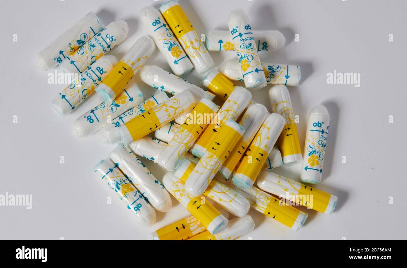 Berlin, Germany. 27th Nov, 2020. Tampons of the brand o.b. and Rossmann's  own brand "facelle" made of organic cotton are lying on a table. Credit:  Annette Riedl/dpa/Alamy Live News Stock Photo -