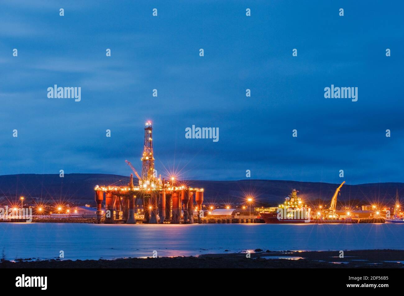 Oil drilling platforms moored in Cromarty Firth, Scotland Stock Photo