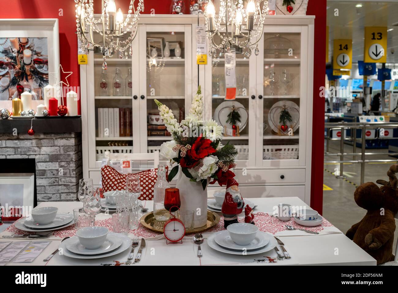A dining table with Christmas decorations in an IKEA store Stock Photo