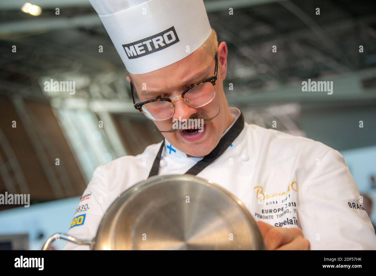 06/12/2018 Turin (Italy) Ismo Sipelainen engaged in the preparation of a refined dish during the Bocuse d'Or challenge Stock Photo