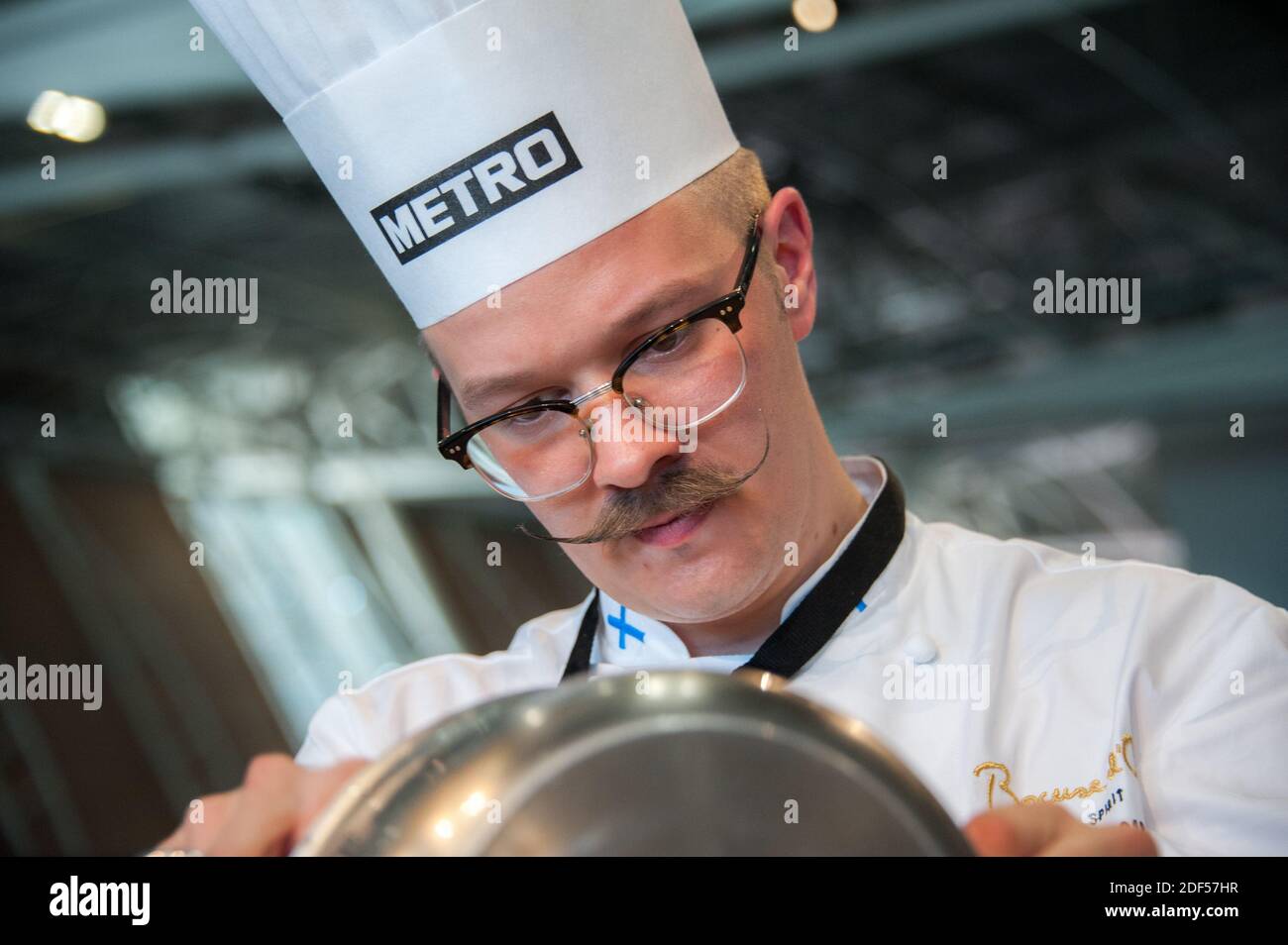 06/12/2018 Turin (Italy) Ismo Sipelainen engaged in the preparation of a refined dish during the Bocuse d'Or Stock Photo