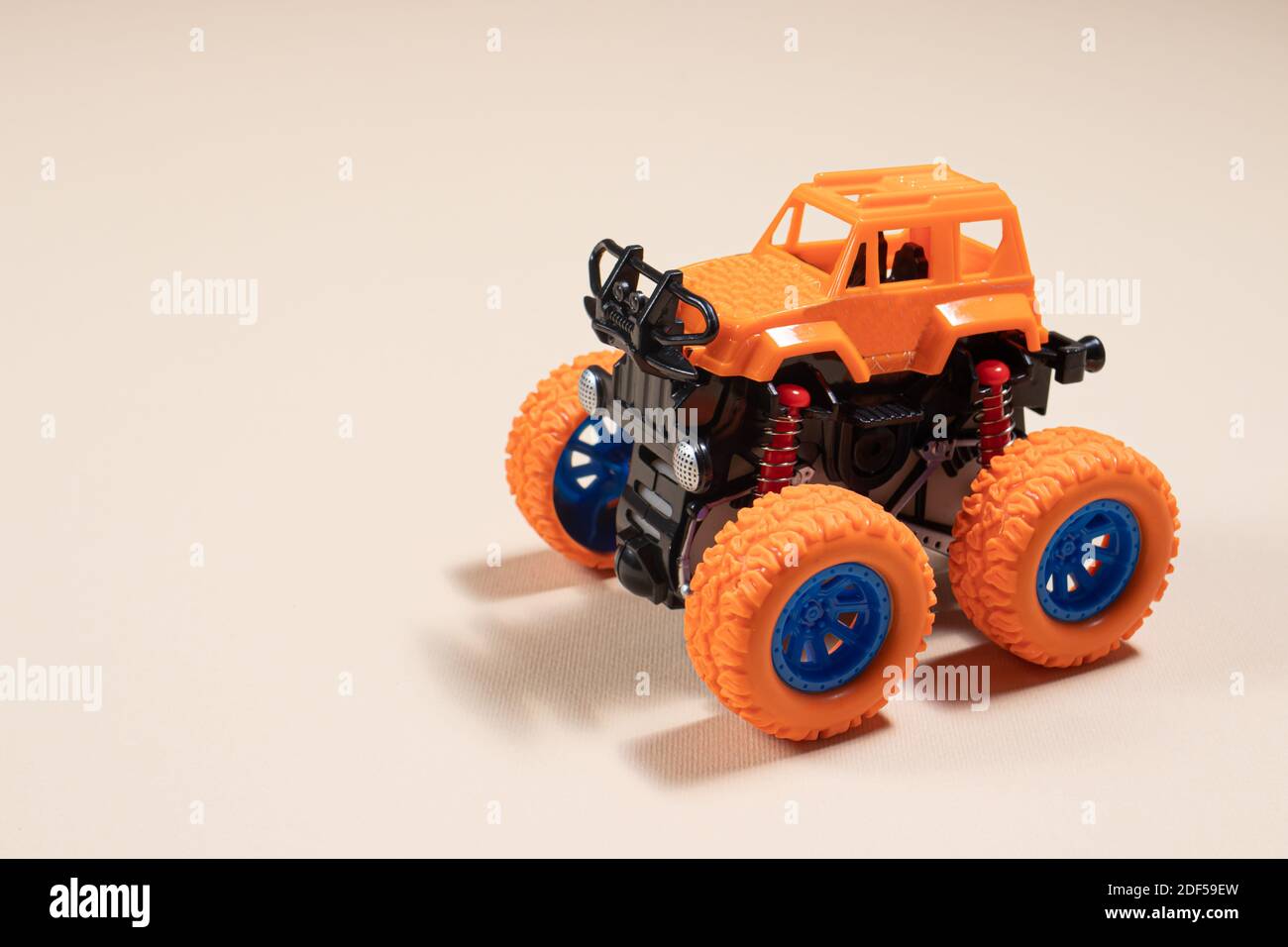Children S Toy Jeep Monster Truck On Beige Background With Place For Text Boy S Car Toy Store Stock Photo Alamy