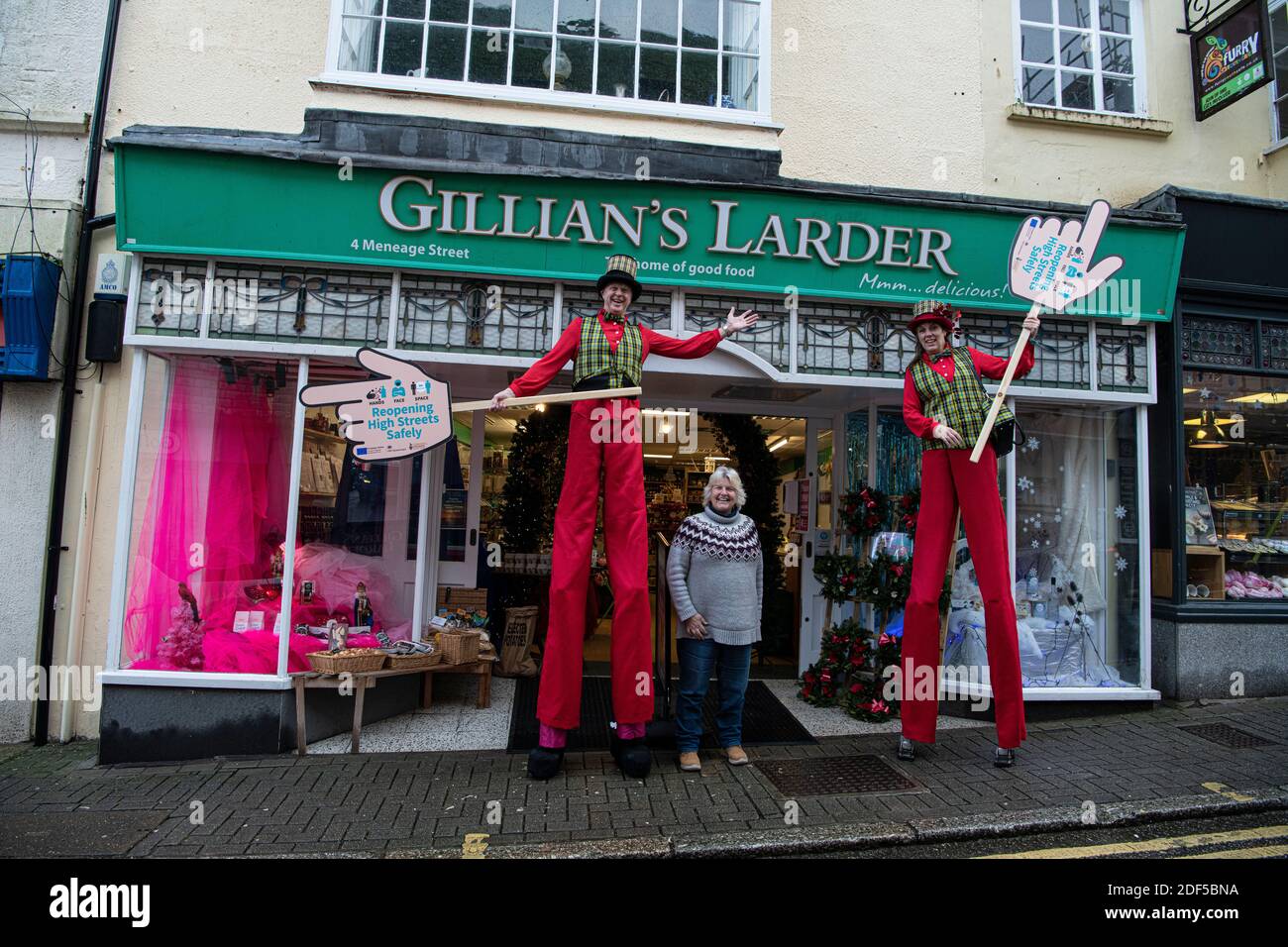 Helston town centre, Cornwall, UK Higher Beings Circus Abby and Star, Cornwall Council is employing Street Ambassadors to advise traders and shoppers on how to shop safely in Helston town centre. Credit: kathleen white/Alamy Live News Stock Photo