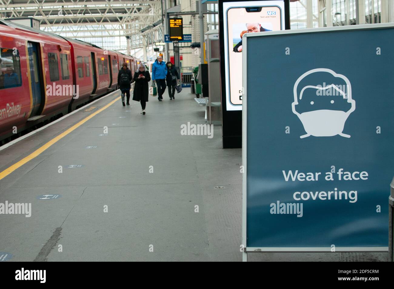 face covering sign at waterloo station Stock Photo