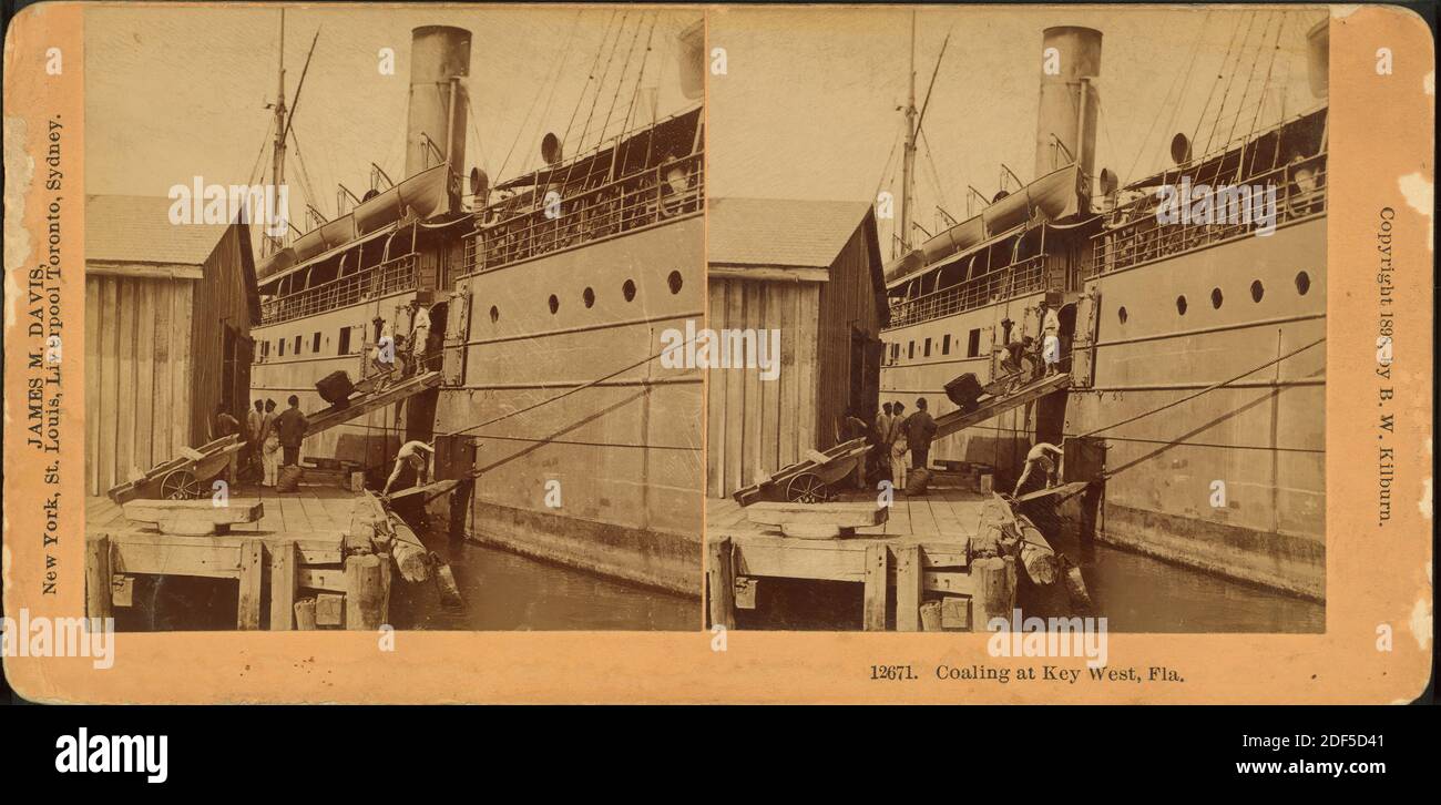 Coaling at Key West, Fla., still image, Stereographs, 1850 - 1930, Kilburn, B. W. (Benjamin West) (1827-1909 Stock Photo