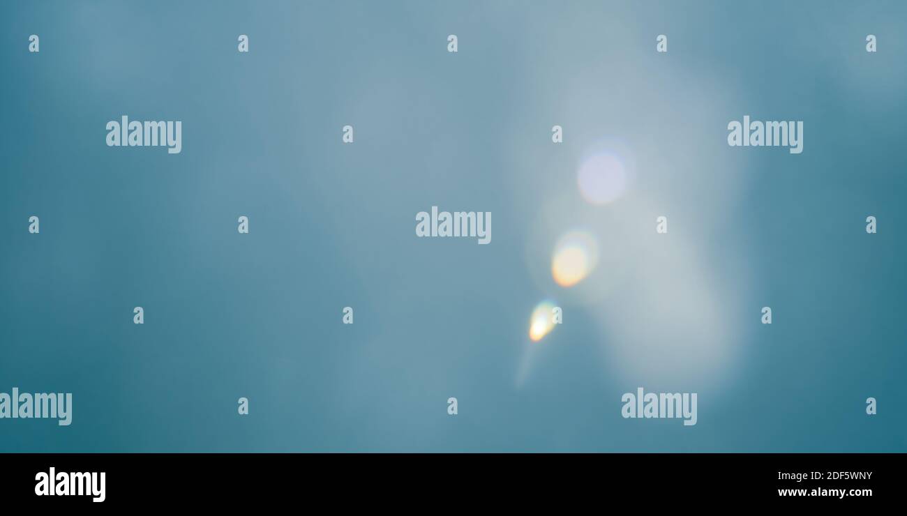 Abstract blue background with lens flare Stock Photo