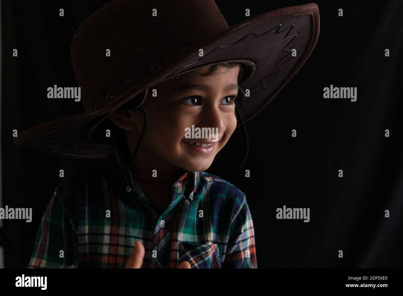 Indian wearing cowboy hat hi-res stock photography and images - Alamy