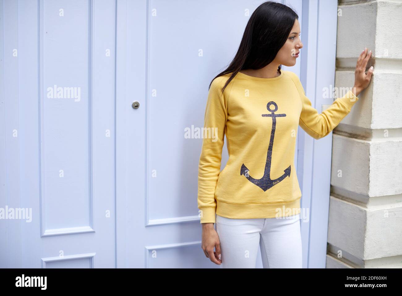 Young woman with sailor sweater, Pasaia, Gipuzkoa, Basque Country, Spain, Europe Stock Photo