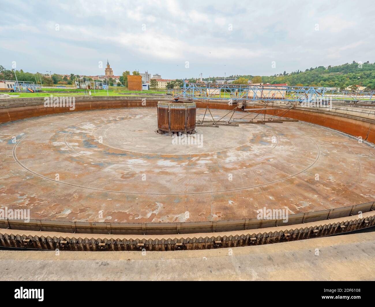 Rusty sedimentation tank in wastewater town plant. Old weathered water