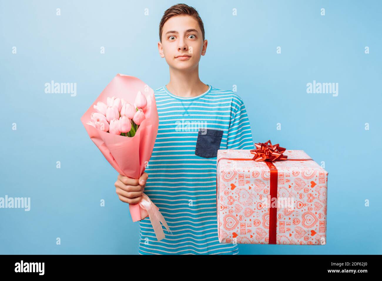 Boy flowers behind hi-res stock photography and images - Alamy