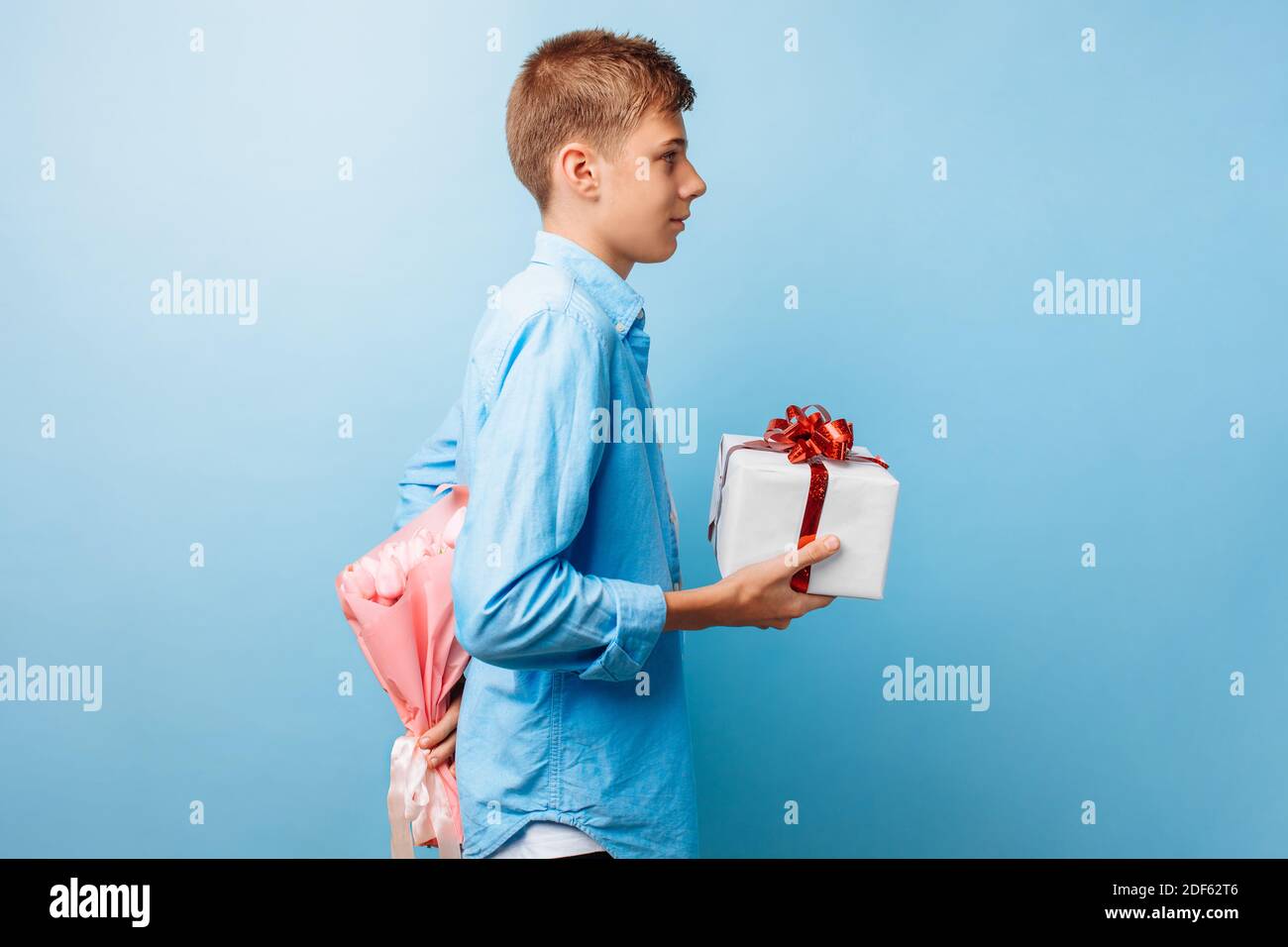 Boy flowers behind hi-res stock photography and images - Alamy