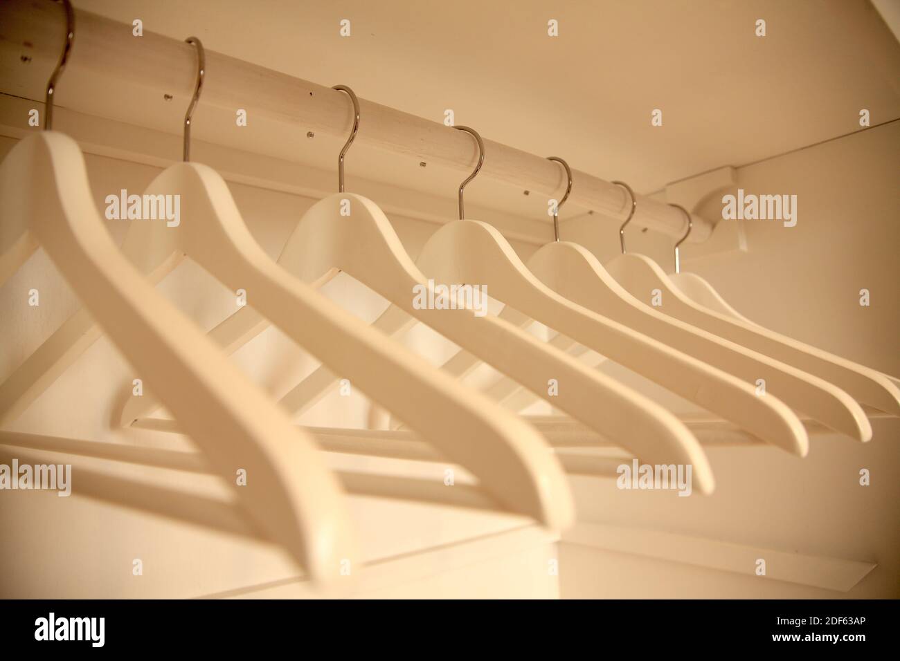 Hangers in closet. Stock Photo
